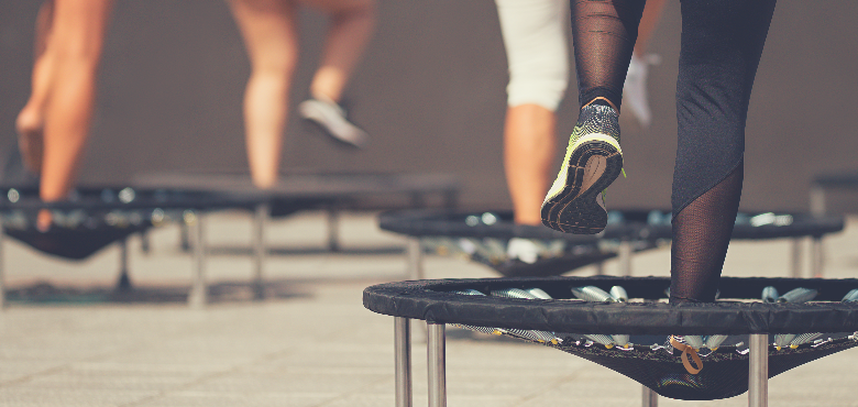 exercise trampoline with bar or rebounder is a new fitness trend 