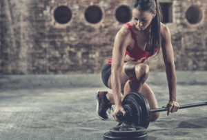 A barbell squat pad can help protect your neck during bodypump class